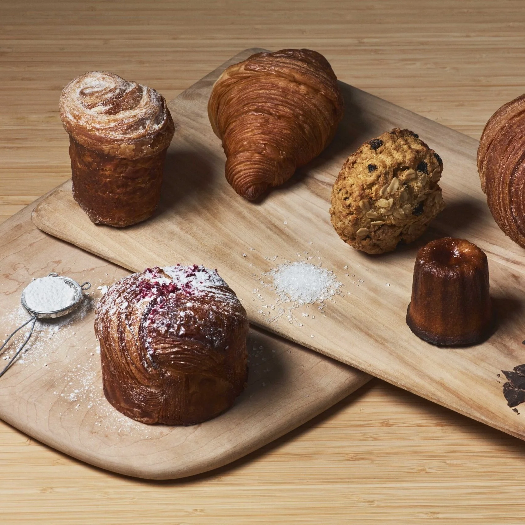 Rustic French pastries and a loaf of bread from Petite Baguette